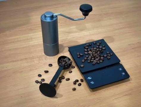 Manual Coffee Grinder, Digital Scale and Roasted Beans for Home Brewing Setup Photos