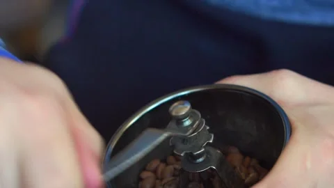Manual coffee grinder, guy grinds coffee 스톡 동영상 161357607