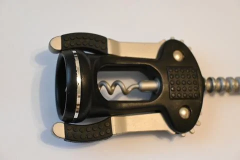 Manual corkscrew on a white background 库存照片