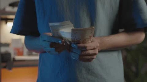 Manual Counting of Pakistani Rupee Notes Stock Footage 337736738