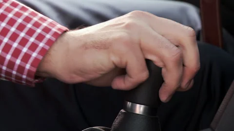 Manual Gear Shift Engaging First Gear in Pickup Truck, Driver Hand Close Up - 4K Stock Footage 323294377