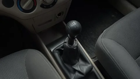 The Manual Gear Shift Inside the Interior of a Car Offers an Engaging Driving Stock Footage 309421737