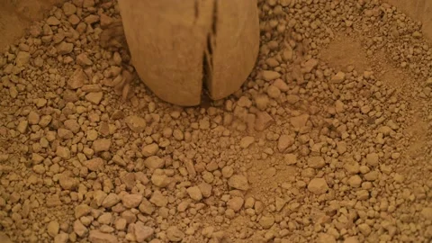 Manual grinding of clay Stock Footage 188949052