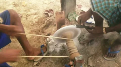 Manual grindstone in Africa Stock Footage
