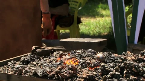 Manual Labor Blacksmith Pounding a Hammer on Hot Metal Stock Footage 52196982