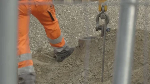 Manual laborer working hard on a construction site Stock Footage 81751164