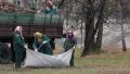 Manual labour. Cleaning in city park HD Footage