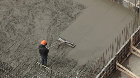 Manual leveling of the concrete floor Stock Footage 105471231