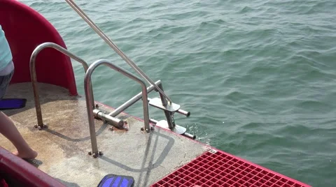 Manual lifting of the ladder on the stern Stock Footage