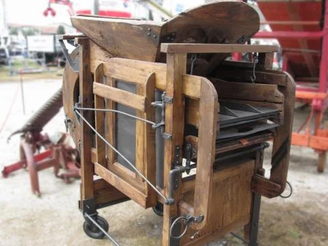 Manual machine used to shell the corn Stock Photos