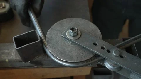 Manual Metal Bending Tool on Workbench Stock Footage 308827833