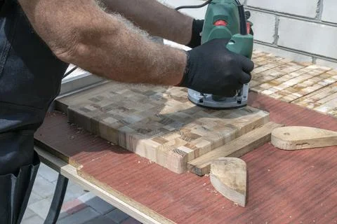 Manual milling machine. The process of making end cutting boards is carried o Stock Photos