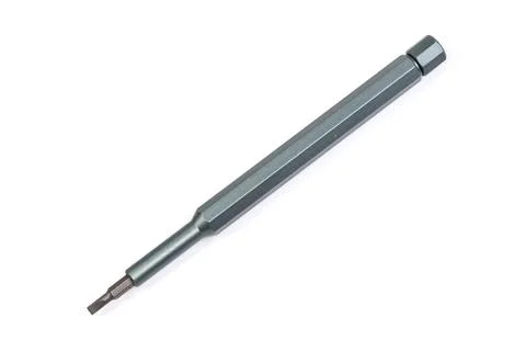 Manual mini screwdriver with inserted flat interchangeable bit close-up Foto stock