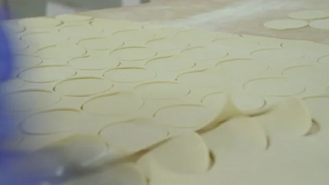 Manual modeling dumplings. The modeling of dumplings at the factory for the Stock Footage 166214905