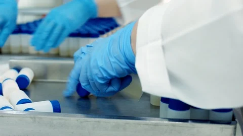 Manual part of the work on the conveyor production Stock Footage 101013902