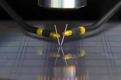 Manual probe system with needles for test of semiconductor on silicon wafer.  Stock Photos