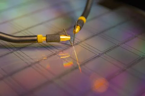 Manual probe system with needles for test of semiconductor on silicon wafer.  Stock Photos