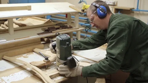 Manual processing of wood with tools at the woodworking and furniture plant 库存影片 79896951
