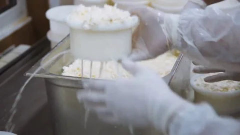 Manual production of cheese Stock Footage 69221516