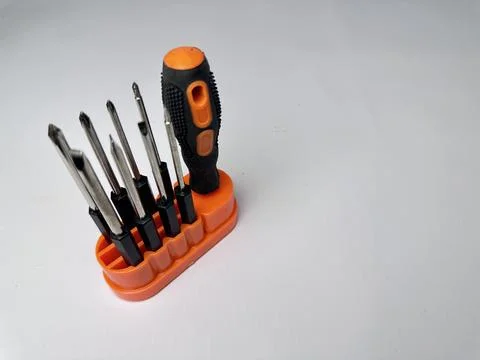 Manual screwdriver set with interchangeable steel bits and handle Stock Photos