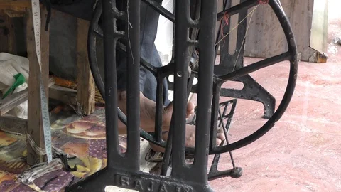 Manual sewing machine which is run by foot on pedal Stock Footage 112853897