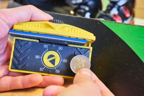 Manual side-edge ski sharpening/tuning tool with scale for various degrees. Stock Photos