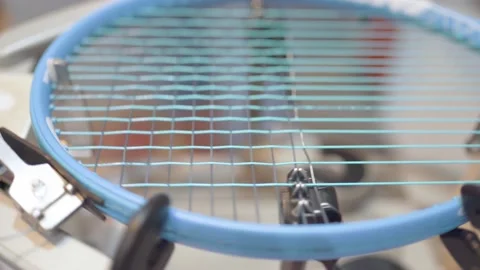 Manual stringing of a tennis racket in service Stock Footage 170026506