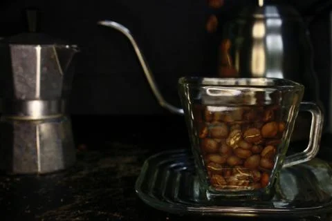 Manual tools for processing a cup of coffee, ranging from coffee cups, mocha  Stock Photos