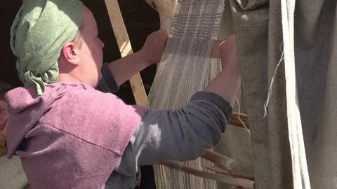 Manual weaving loom machine in ancient times, close up process Stock Footage 69734215