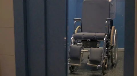 Manual wheelchair out of the elevator Stock Footage 46966718