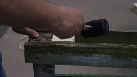 Manual wood cutting using handsaw on solid board Stock Footage 308018271
