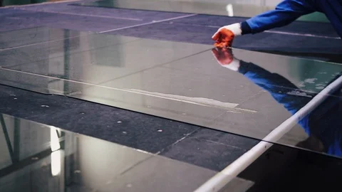 Manual worker assembling PVC doors and windows. Video stock 129367675