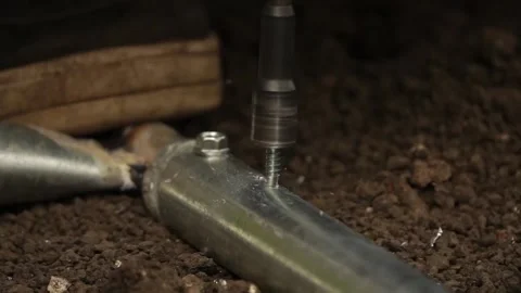 Manual worker assembling the structure of resistance Stock Footage 243708177