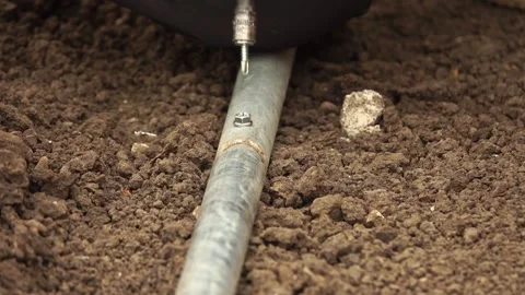 Manual worker assembling the structure of resistance Stock-Footage 243708542