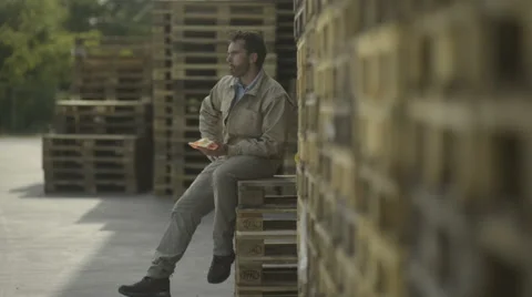 Manual worker having a lunch break; Full HD Photo JPEG Stock Footage 40758167