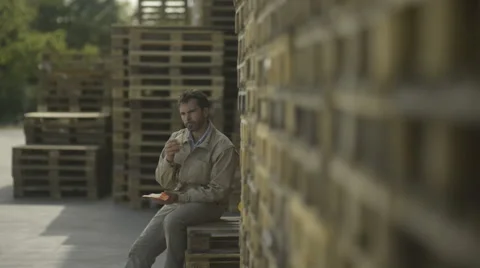 Manual worker having a lunch break; Full HD Photo JPEG Stock Footage 40758203