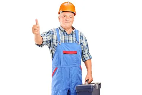 Manual worker holding a tool box and giving a thumb up Stock Photos