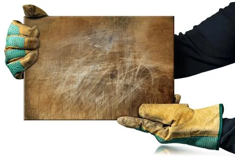 Manual Worker with Protective Work Gloves Holding a Rusty Metal Plate Stock Photos