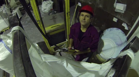 Manual Worker Using a Crane in Factory Stock Footage 33034771