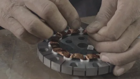 Manually assembling the part - Shot on Sony FS7 Stock-Footage 91176587