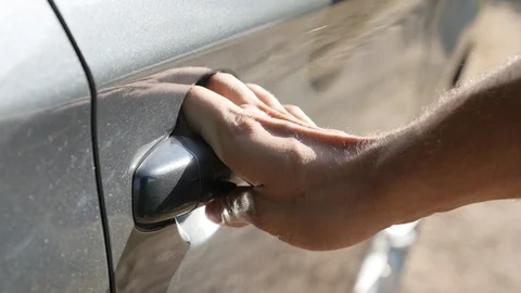 Manually closing opened car door 4K footage Stock Footage 123471931