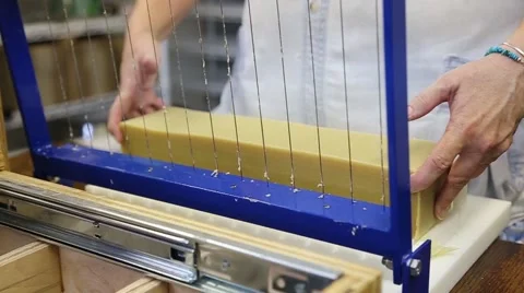 Manually Cutting Bars of Homemade Soap Stock Footage 65887078