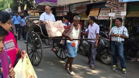 Manually Pulled Rikshaw in the street of Kolkata Stock Footage 98914710