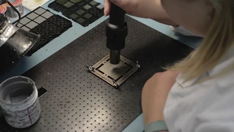 Manufacture of microchips. Remove the stencil and extract the finished chip Stock Footage 85227206