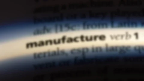 Manufacture word in a dictionary. Stock Footage 99563340