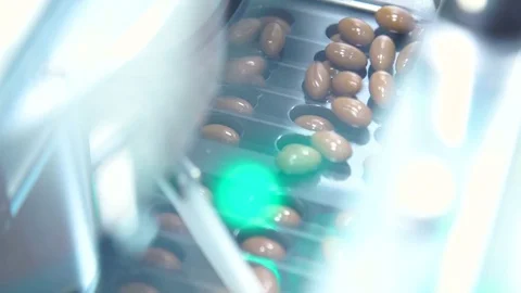 Manufacturing and packaging of tablets at a pharmaceutical plant Stock Footage 76087969