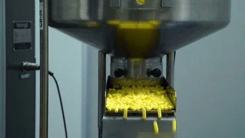 Manufacturing and packaging of tablets at a pharmaceutical plant Stock Footage 76099538