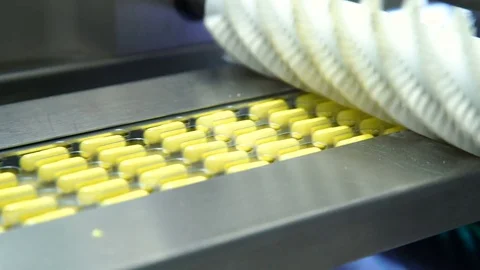 Manufacturing and packaging of tablets at a pharmaceutical plant Stock Footage 76100271