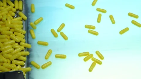 Manufacturing and packaging of tablets at a pharmaceutical plant Stock Footage 76101062