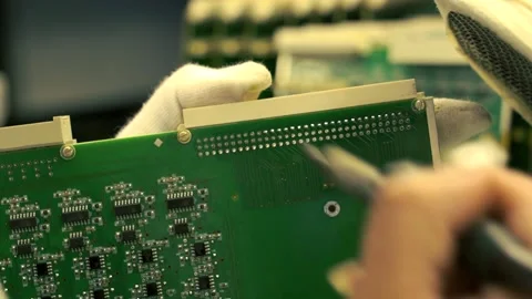 Manufacturing of a computer board by hand. 動画素材 144611748